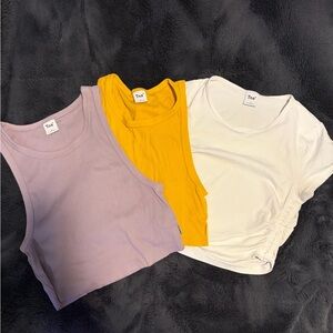 TNA Crop Tops in Purple, Yellow, and White